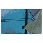 Přední strana deky s motivem a zadní strana melírovaná