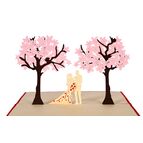 Svatební pár pod stromy